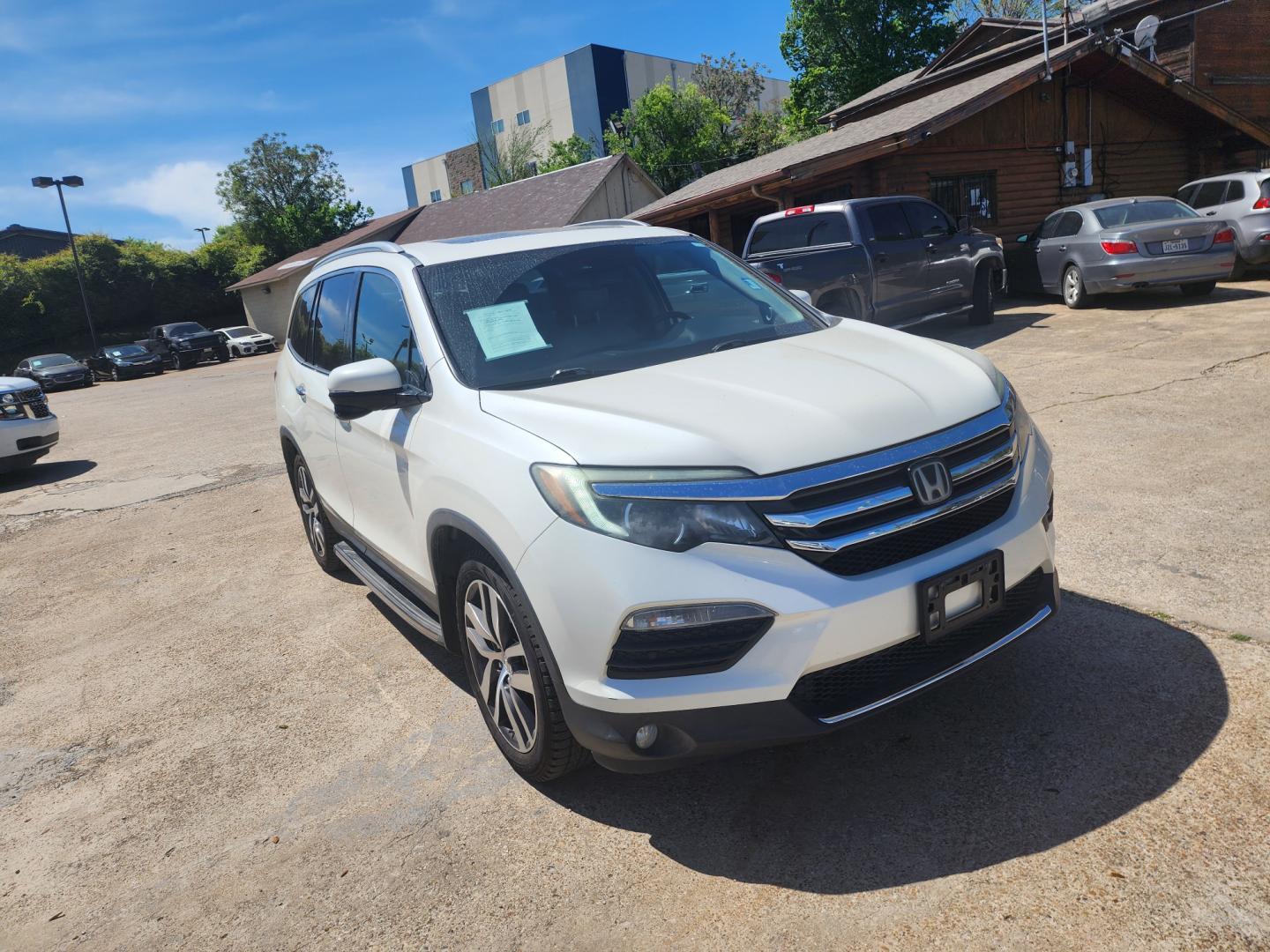 2016 white Honda Pilot Touring 2WD (5FNYF5H98GB) with an 3.5L V6 SOHC 24V engine, 9-Speed Automatic transmission, located at 945 E. Jefferson Blvd, Dallas, TX, 75203, (214) 943-7777, 32.752514, -96.811630 - Photo#2